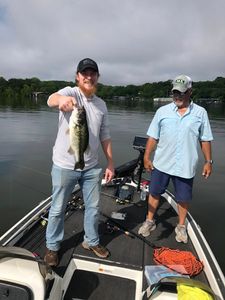 Two people fishing in MO