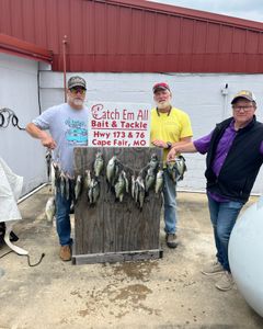Three anglers enjoying fishing trip in MO
