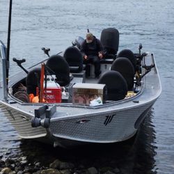 Angler with fishing rod enjoying scenic view of Pasco