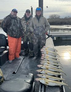 3 people fishing with 2 big fish in Washington state