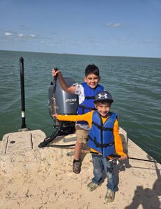 Two people fishing at South Padre Island