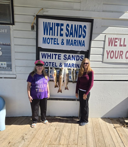 Couple enjoying a fishing trip at South Padre Island