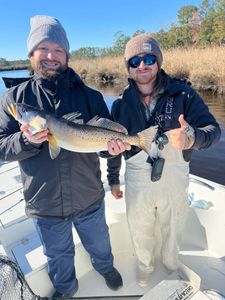 Two people fishing in New Bern