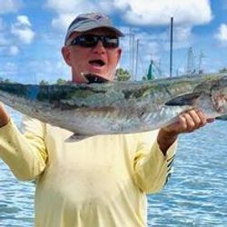 A person fishing for a great barracuda in Galveston