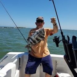 Angler catches fish in TX