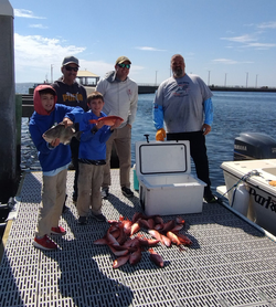 5 people fishing in Panama City