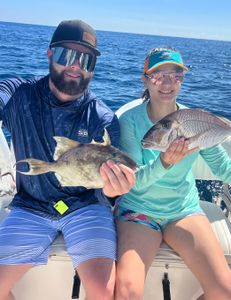 Two anglers enjoying a fishing trip in FL