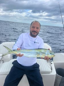 Angler reeling in a 22-inch catch in Florida