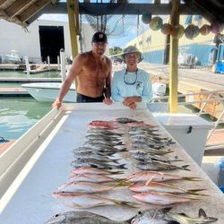 Two people enjoying a cruises and fishing adventure in FL
