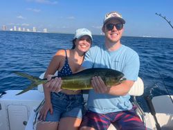 Two people enjoying a cruises and fishing trip in West Palm Beach