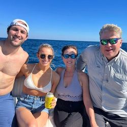A group of 4 people enjoying a cruise and fishing trip in West Palm Beach