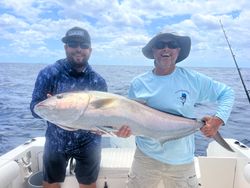 3 people enjoying a fishing cruise in West Palm Beach