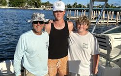 Three anglers enjoy a fishing trip in Florida