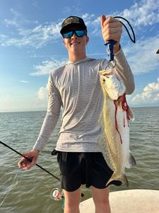 A person fishing in Matagorda