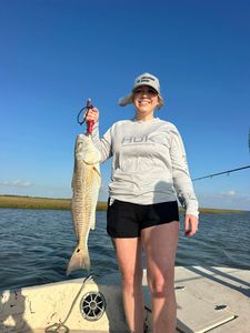 Redfish caught while fishing in Matagorda TX held up on boat