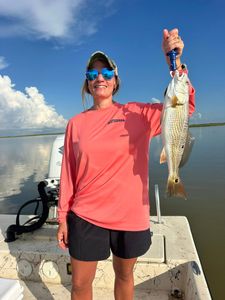 Angler with a redfish in Matagorda