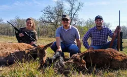 Four people enjoying a hunting trip in Haskell