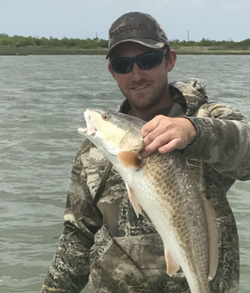 Fisherman with 1 caught fish in Rockport