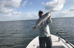 A person fishing in TX