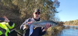 Angler with a sea trout catch in OR