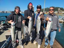 5 chinook salmon, coho salmon, and sea trout caught fishing in OR