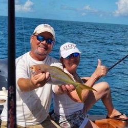 Two anglers with fishing rods in FL