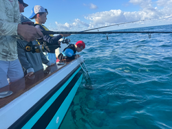 Spending the day on the water, reeling 'em in.
