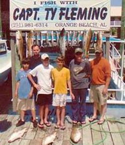 Three people enjoying cruises, fishing, and tours in Orange Beach