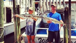 Two anglers with big 34-inch fish at Orange Beach