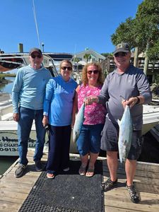 Two king mackerel fish caught by four people at Murrells Inlet
