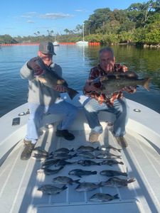 2 anglers fishing with rods in a scenic location