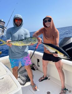 Two anglers fishing at location 33036