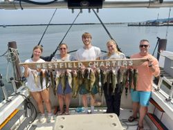 5 people fishing in NY