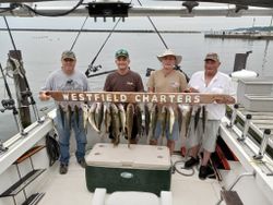 4 people fishing in New York