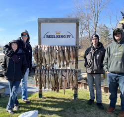 Four people fishing in MI