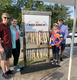 4 people enjoying fishing trip in MI
