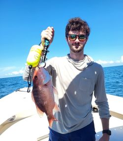 Person fishing at Edisto Beach