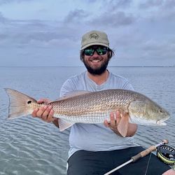 Targeting redfish on calm inshore waters