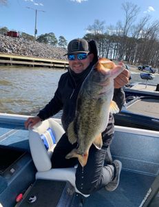 Angler with a large largemouth bass caught in Chattanooga