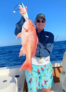 Angler with large fish in Port Isabel