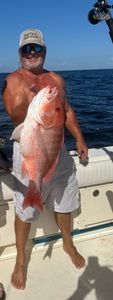 Red snapper caught fishing in Port Isabel TX displayed on boat deck