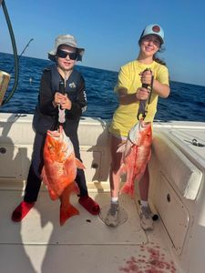 Two large red snapper caught during deep sea fishing trip in Port Isabel TX