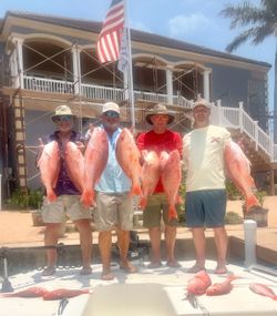 Successful red snapper fishing trip in Port Isabel TX with multiple large fish displayed