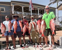 Red snapper fishing catch displayed at Port Isabel TX marina dock