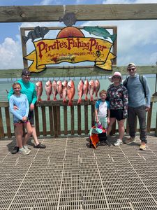 Red snapper fishing catch displayed on pier in Port Isabel TX