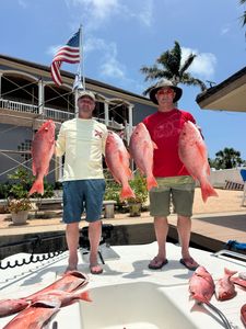 Red snapper fishing catch displayed on boat deck in Port Isabel TX