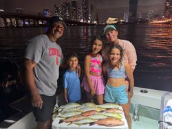 5 people enjoying a fishing trip in FL