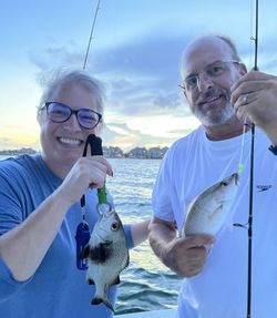 Two anglers fishing on the coast of FL
