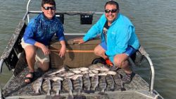 Two people enjoying fishing in Rockport