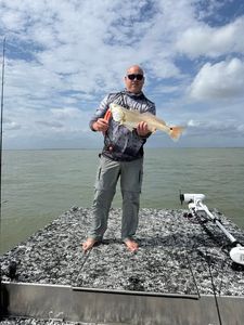 Redfish catch displayed on boat deck in Rockport TX fishing waters